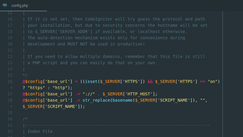 Tampilan editor kode menunjukkan logika PHP untuk mengatur variabel config base_url menggunakan global server variables.